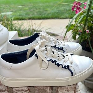 size 9.5 white tory burch sneakers with navy detailing